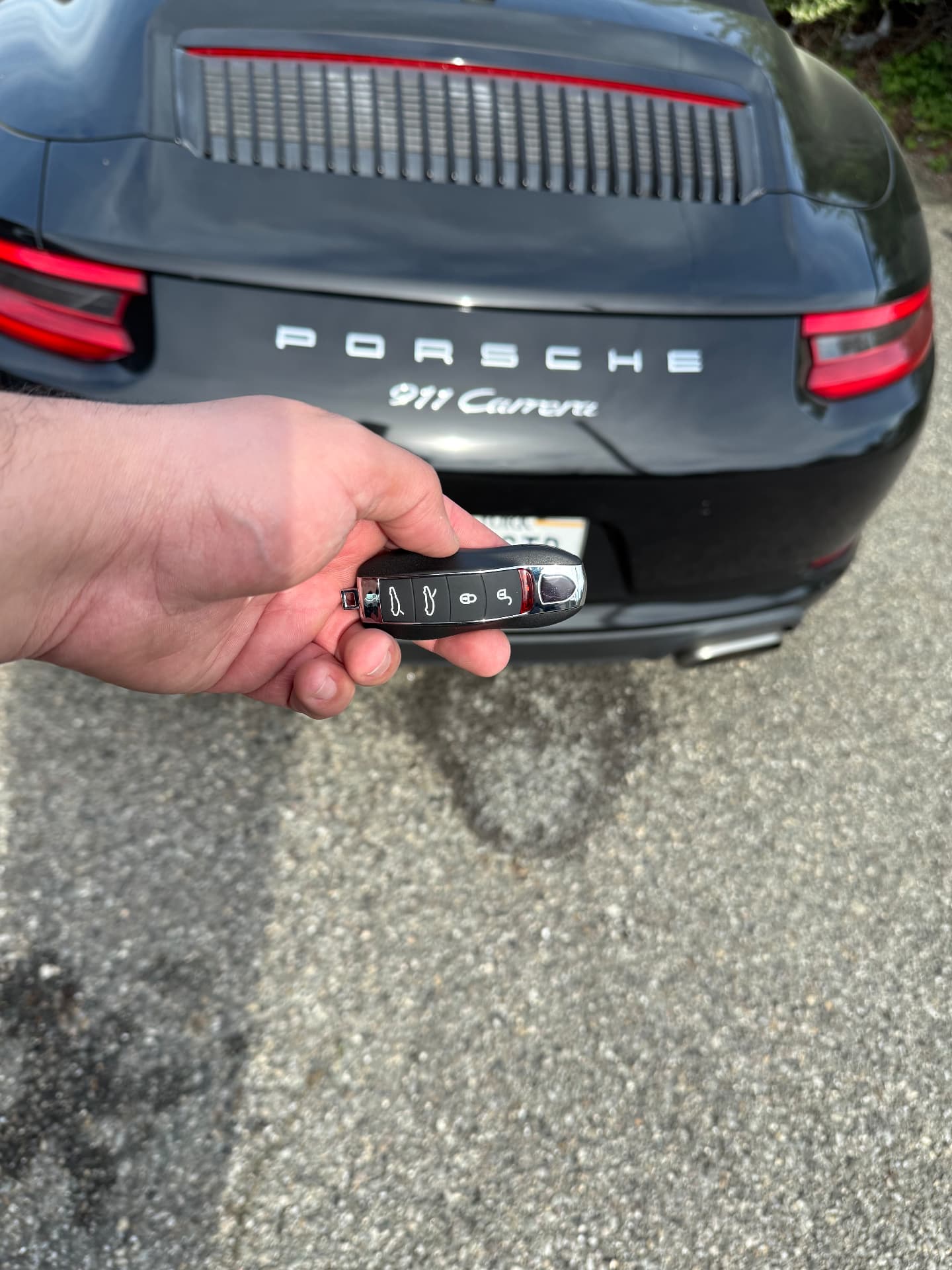 Elite Locksmith & Car Keys Melville technician unlocking a car door at night in Long Island